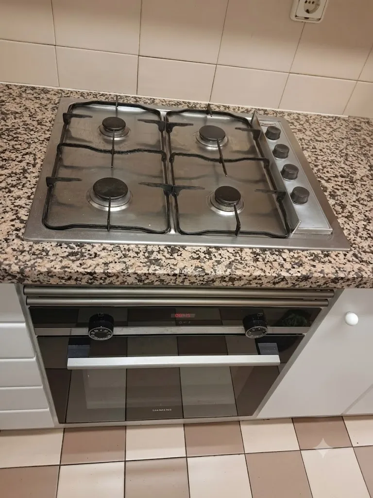 Placa de gas antiga abans de la substitució